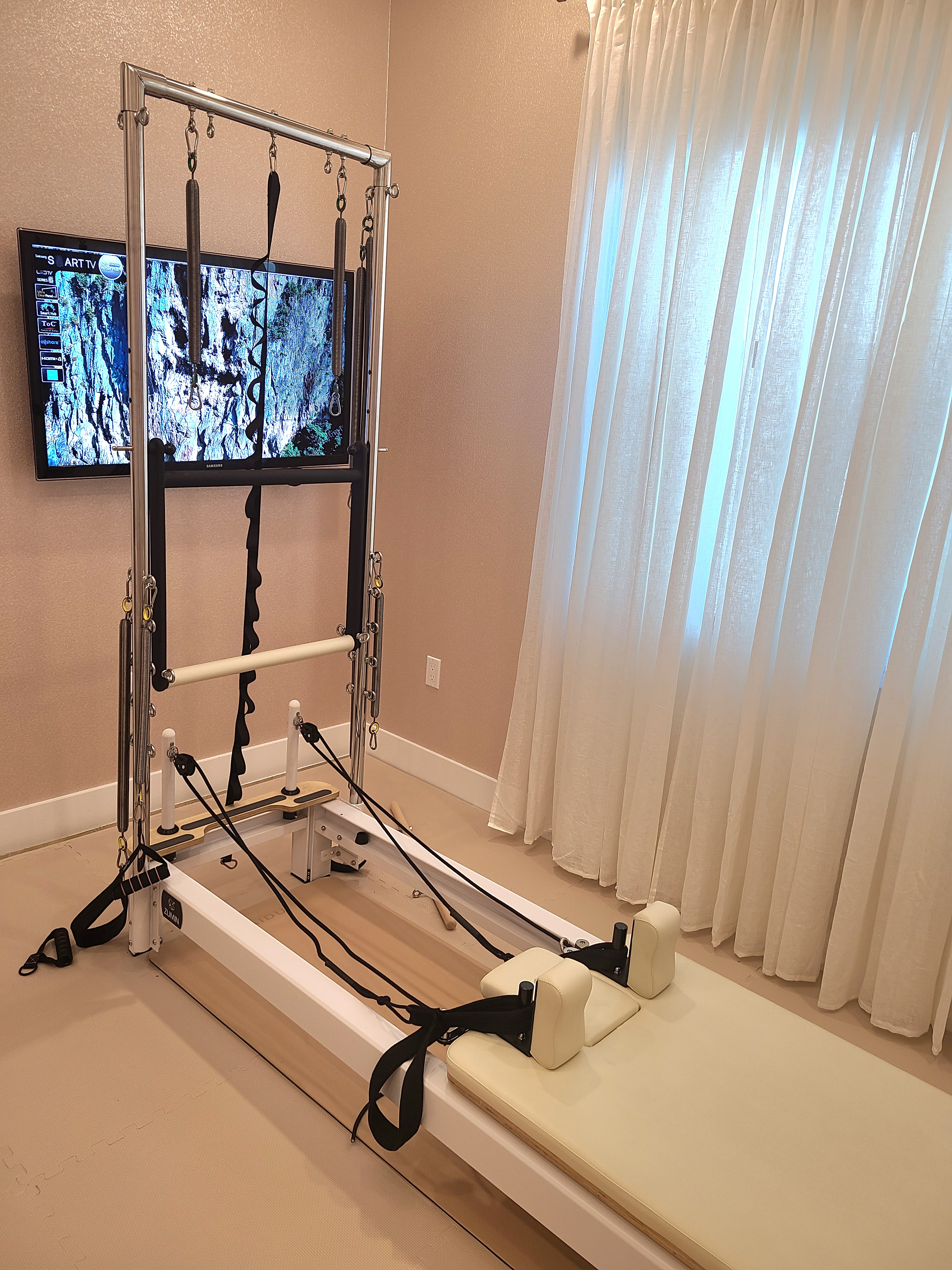 ZUMIN Pilates Studio in Boca Raton with reformer and tower
